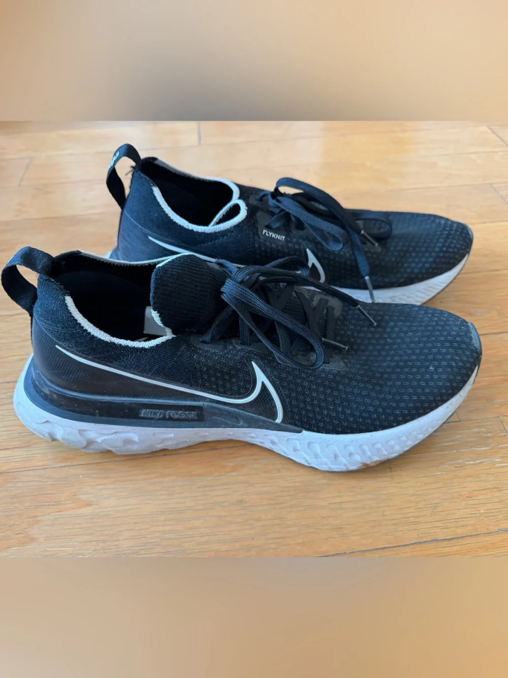 Nike Men's React Flyknit Black and White Running Shoes